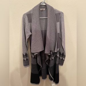 Woman’s Evolution wrap sweater.